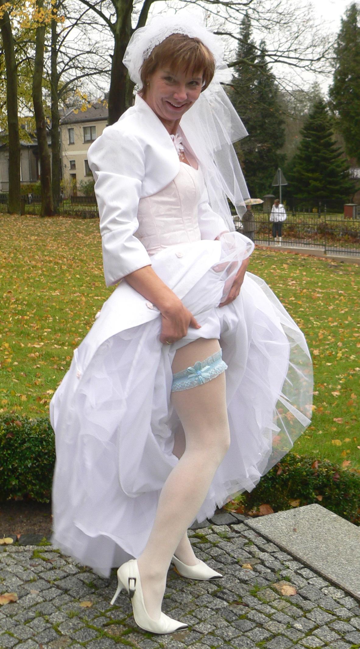 Blonde Mature Bride wearing White Lycra Opaque Pantyhose, Stilettos and White Long Tulle Dress